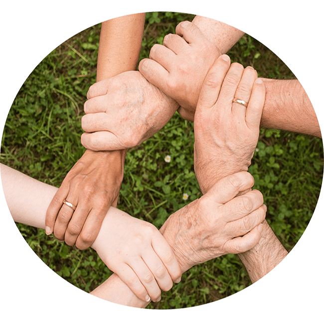 Hands grasping to form a chain