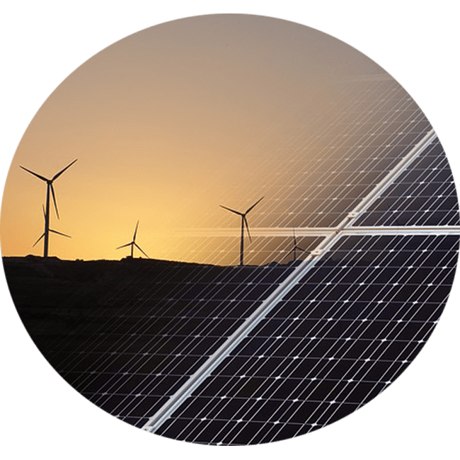 Solar panels and windmills in the background