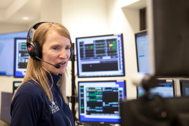 Provider with a headset in the tele ICU